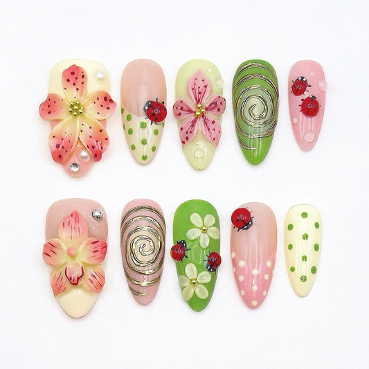 Ladybug-themed press-on nails