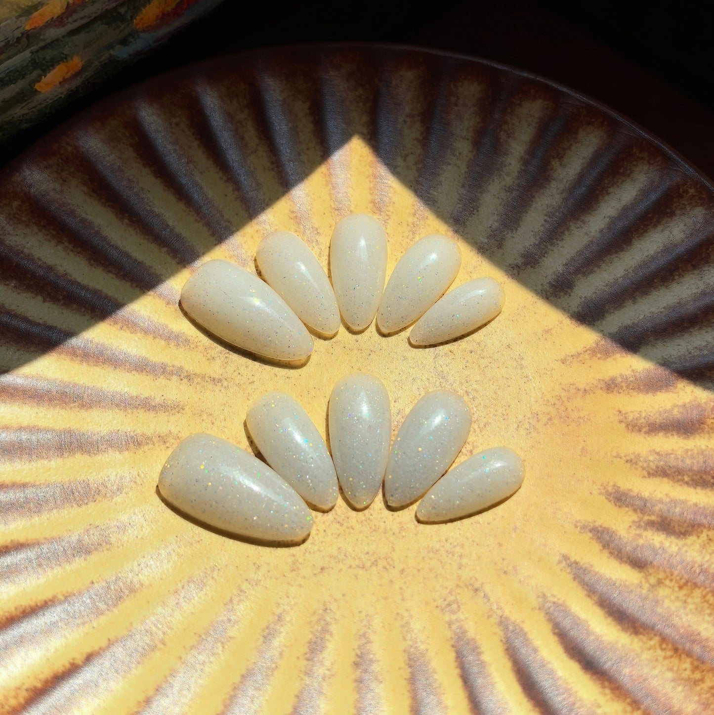 Custom-blended milky white with fine shimmer
