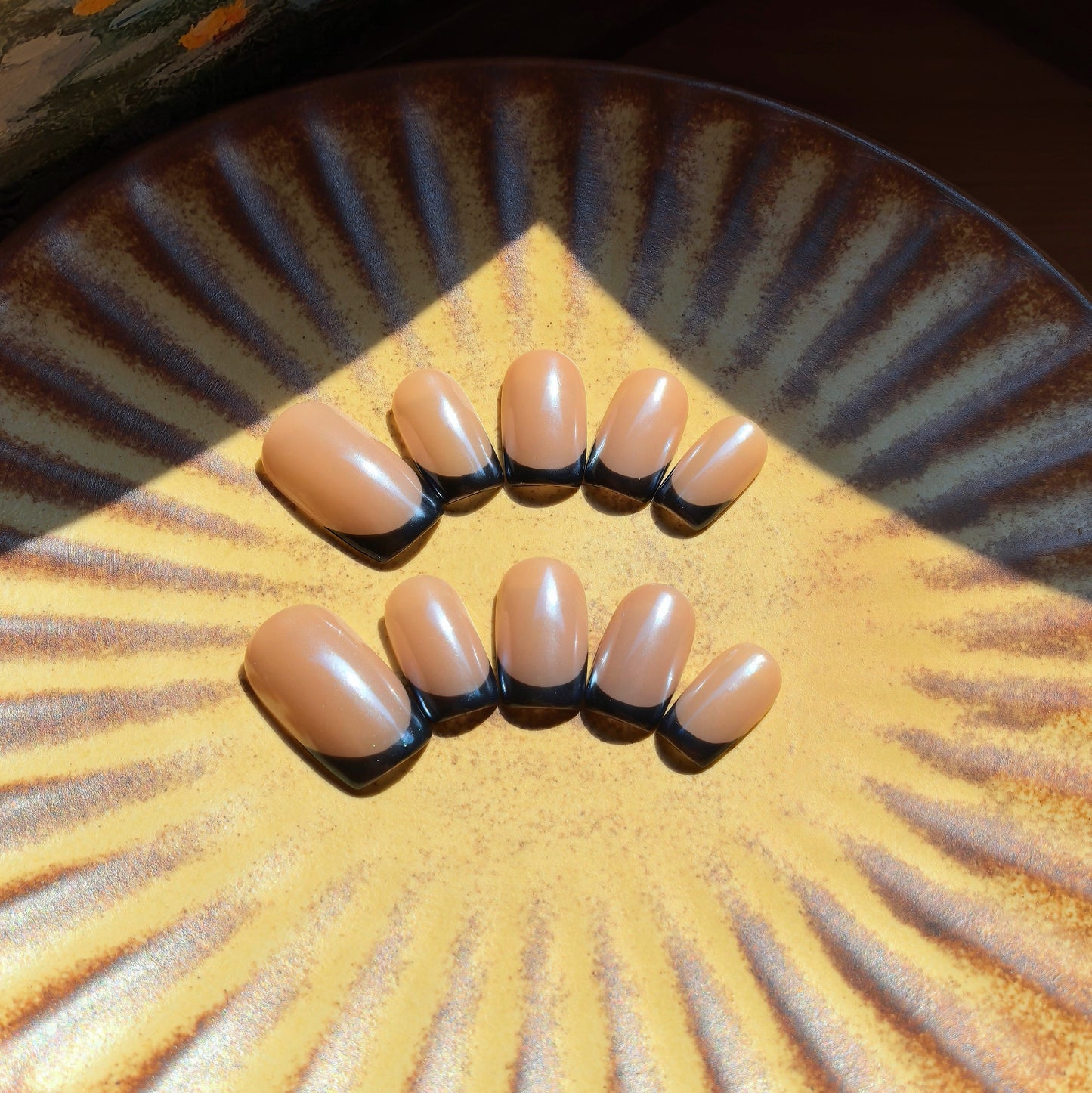 Hailey's black French manicure